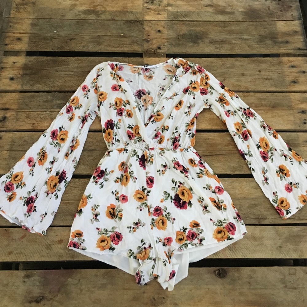 Bell sleeve deep v flowered romper