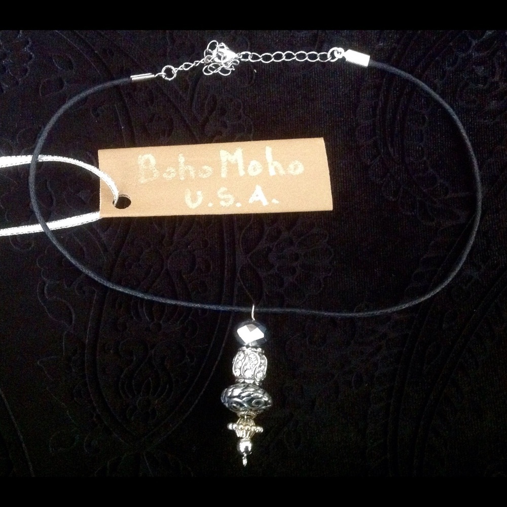 Silver choker on black cord