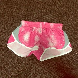 Pink Nike shorts