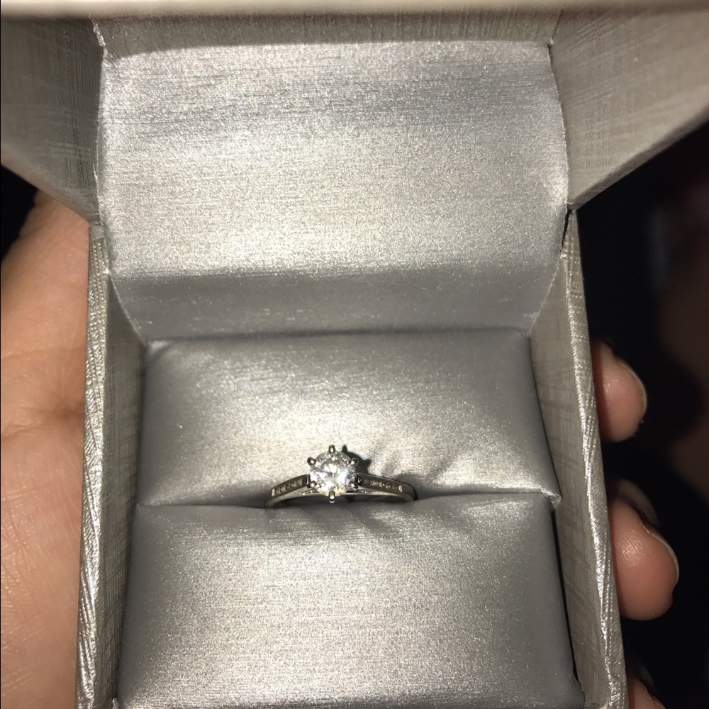 .25 carat diamond on 6 prong Tiffany setting 14k