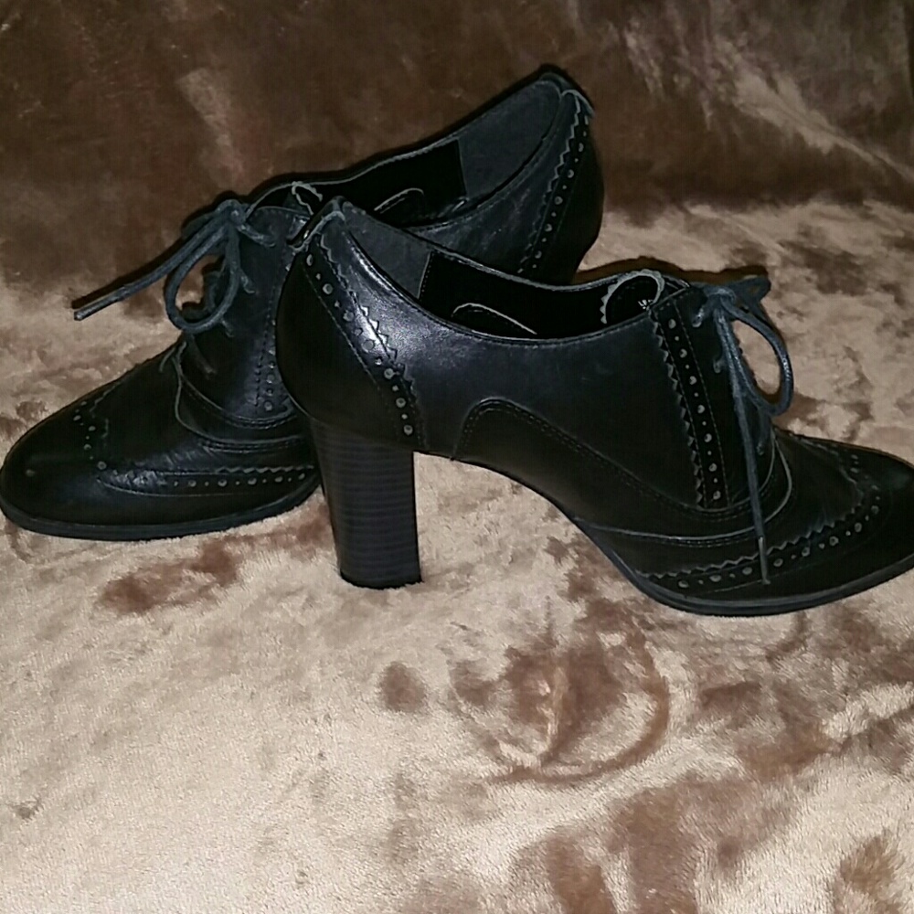 Black leather high heel shoes