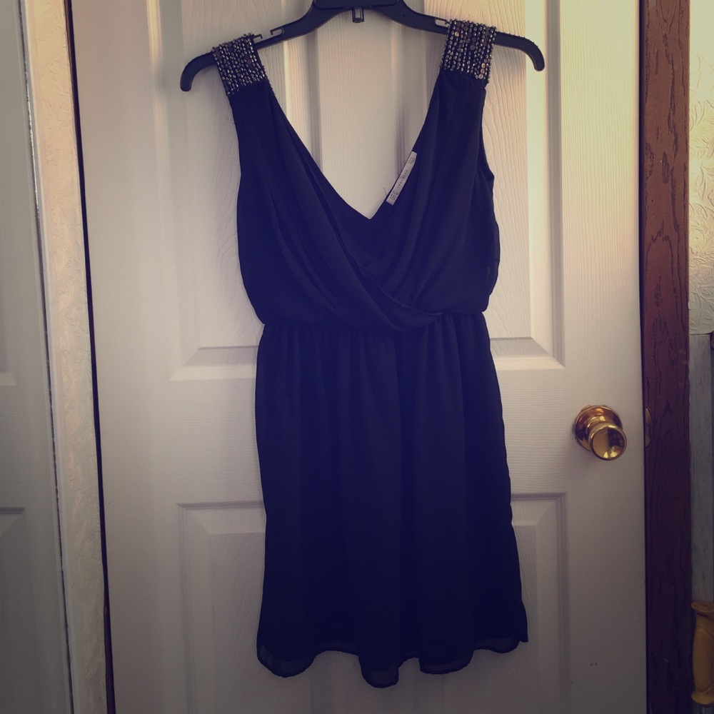 Flowy navy dress with sequined shoulders