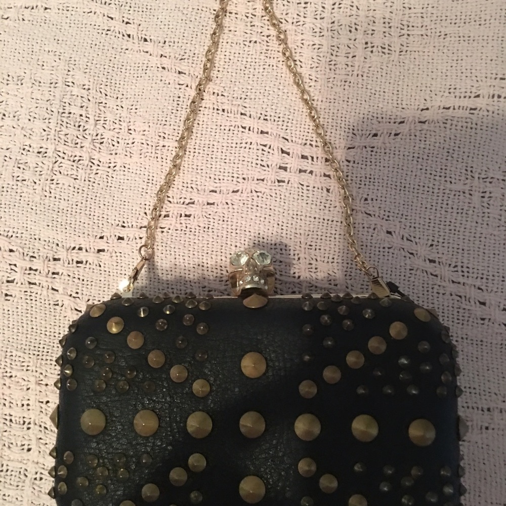 Skull black leather and gold metal clutch/ purse