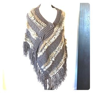 Beautiful three button poncho trimmed in rabbit!