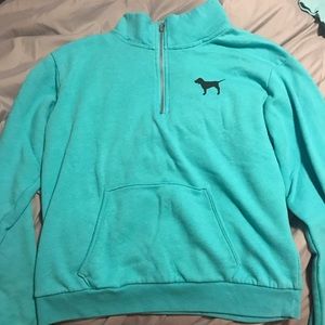 PINK half zip sweatshirt.