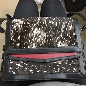 Christian lounoutin calf hair purse