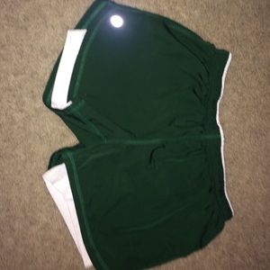 Green athletic shorts