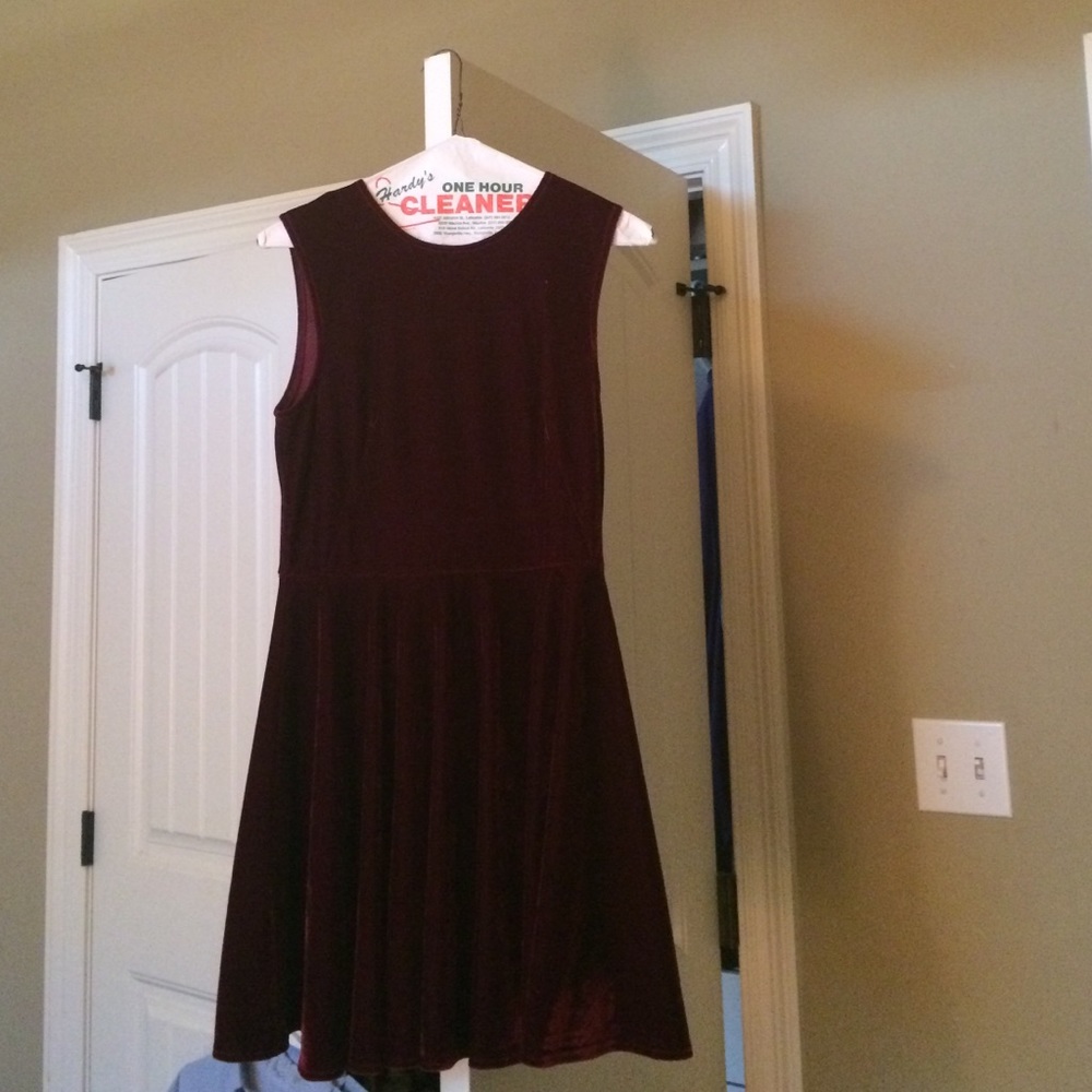 A burgundy suede dress