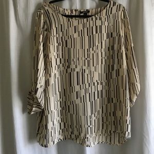 Geometric print blouse.