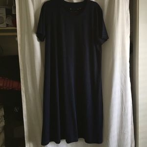 Knee length shift dress.