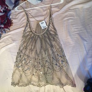 Sequenced sheer tank top