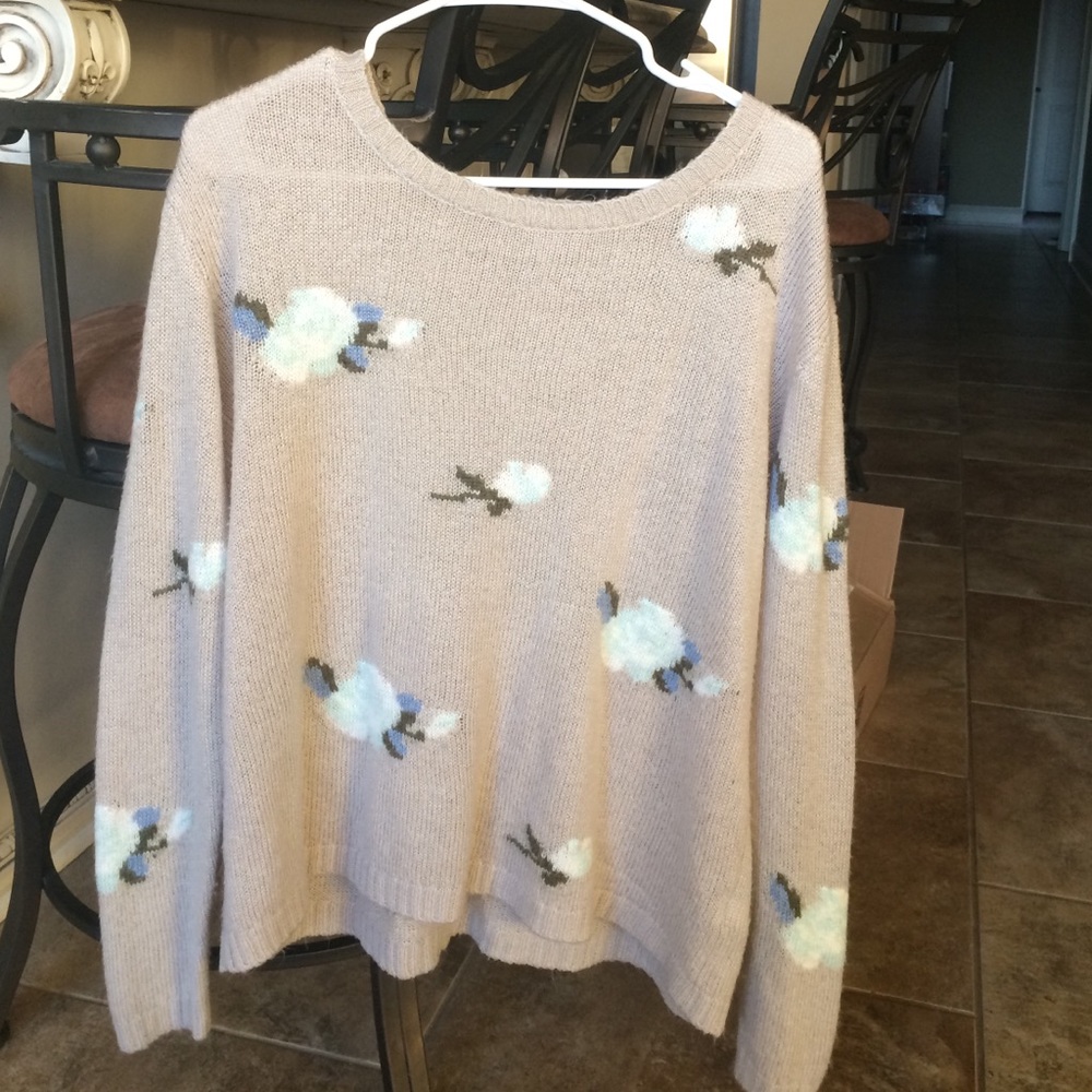 Sweater with flowers on it