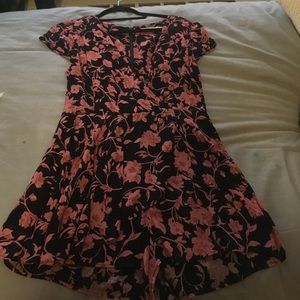 Urban Outfitters black floral romper.