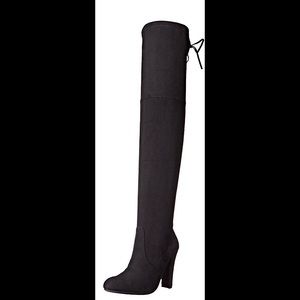 Black thigh high boots. Only worn once.