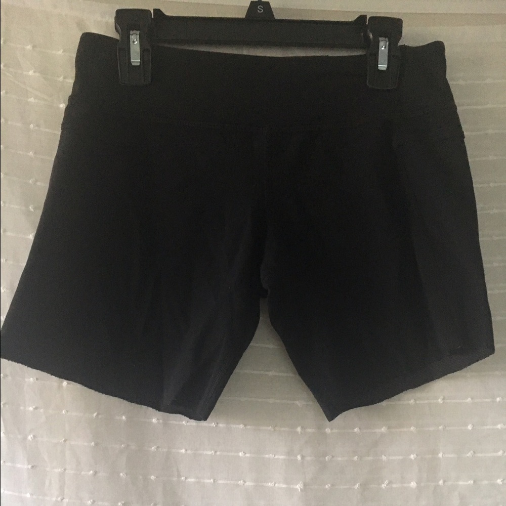 Two pairs of Lululemon compression shorts size 4