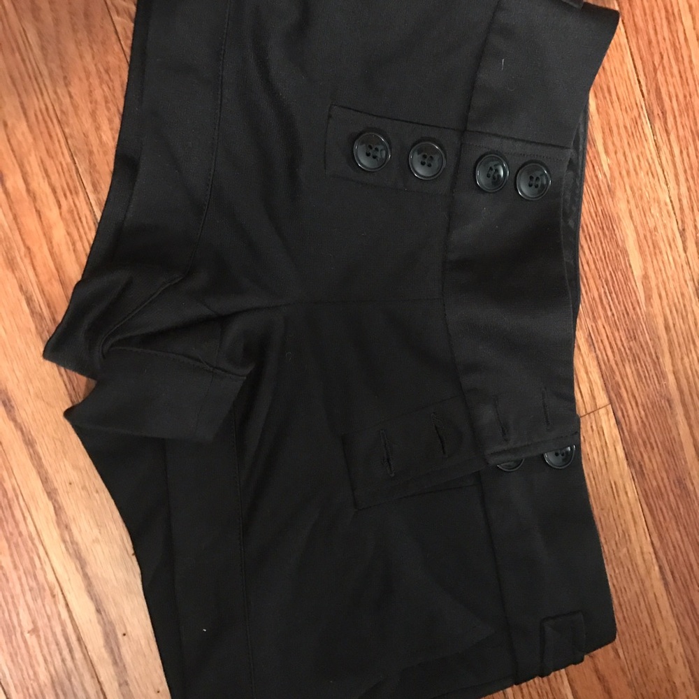 Black button shorts