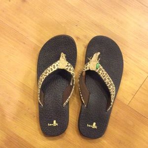 Leopard print flip flops