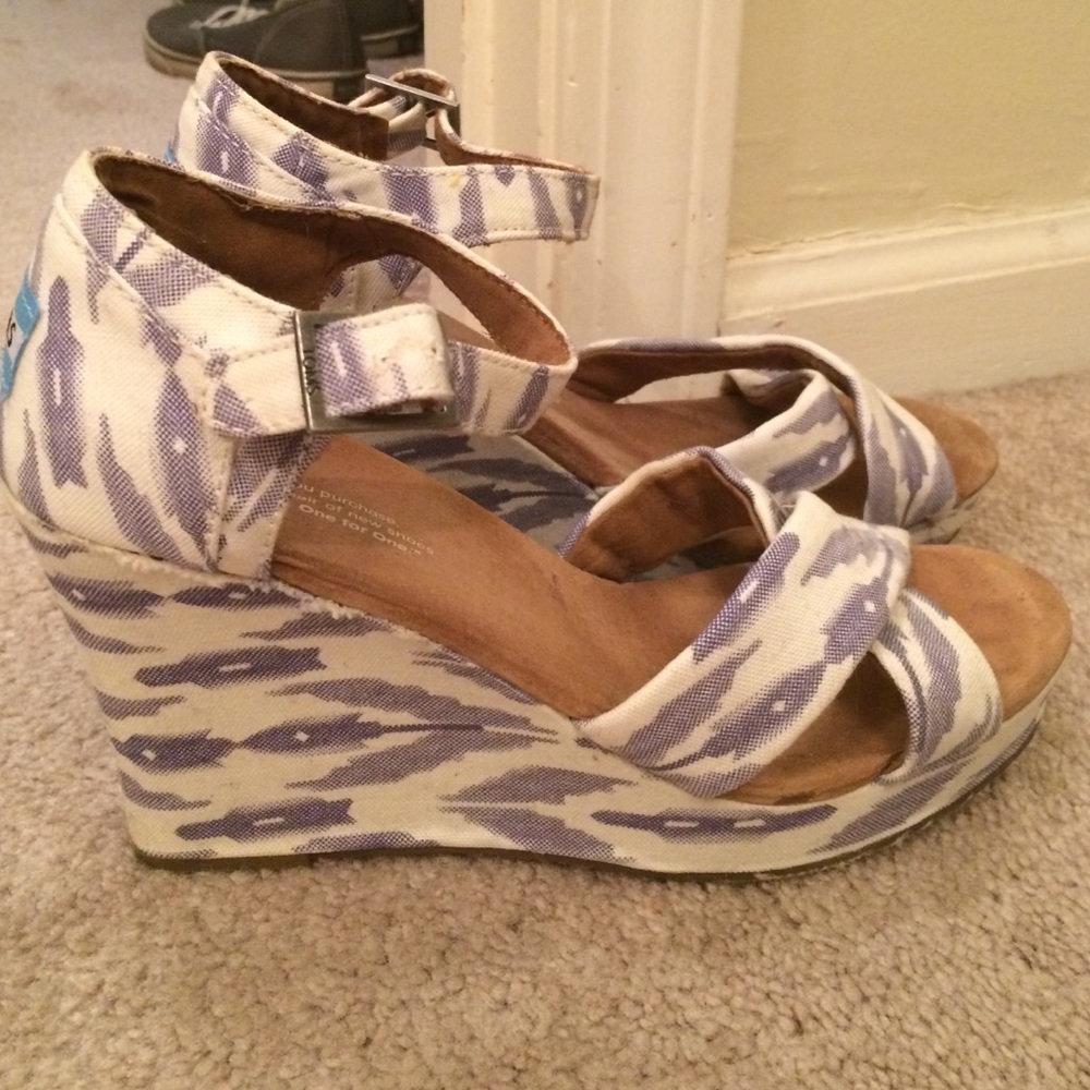 White and blue TOMS wedges