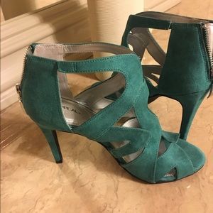 Green shoes with silver zippers