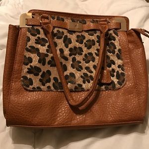 Gently used leopard handbag