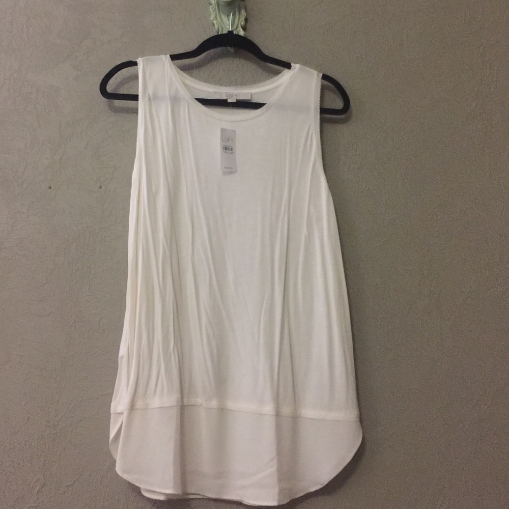 Ivory loft shell.  Sheer front/back tails.