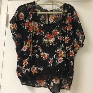 Sheer floral top with laced trimmed bottom