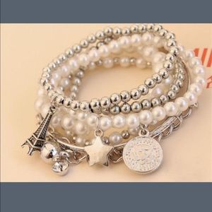 Pearl of the Eiffel Tower multilayer bracelets .