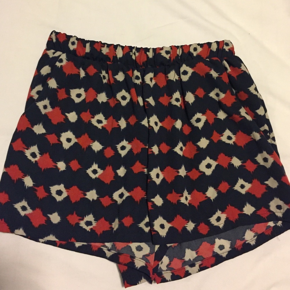 Navy, cream, and burnt orange flowy shorts
