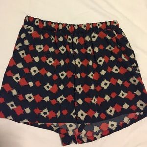 Navy, cream, and burnt orange flowy shorts