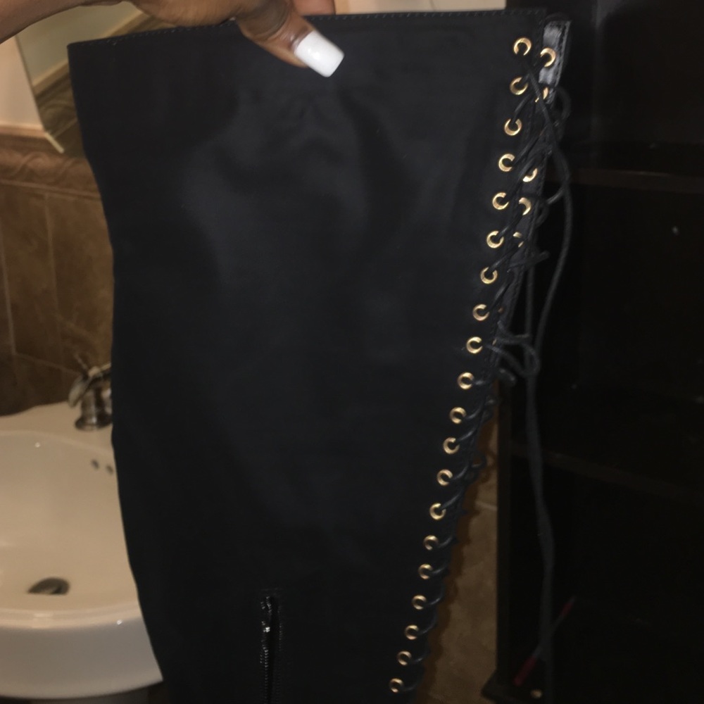 Thigh high boots.