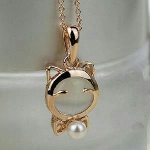 White faux opal gold cat pendant necklace