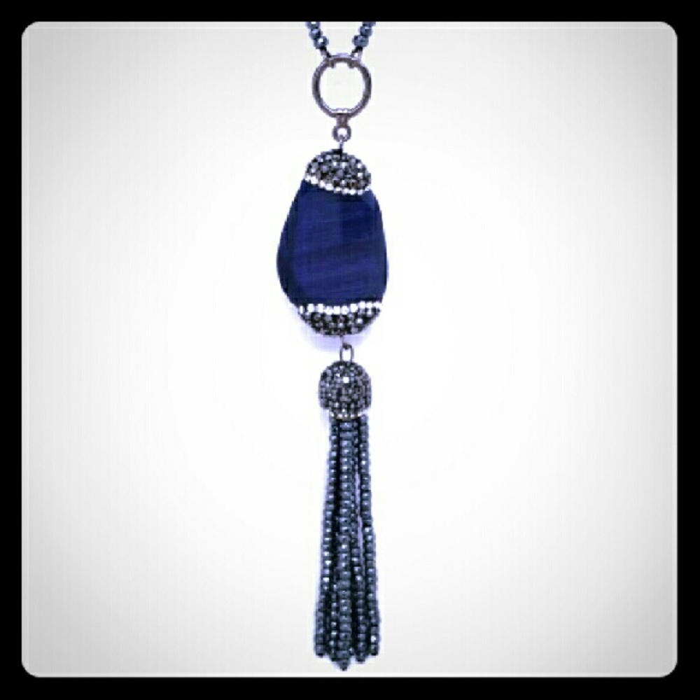 Necklace with blue cat eye pendant