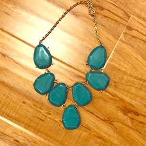 Chunky teal statement necklace.