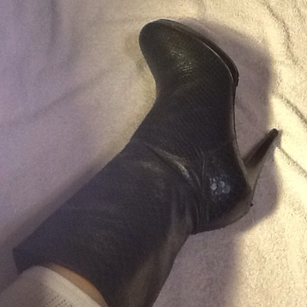 Black Cole Haan snake print boots