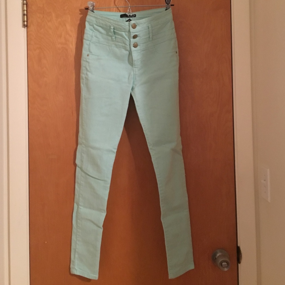 Mint green high waisted skinny jeans size 4.