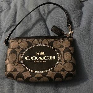 New without tags large black wristlet