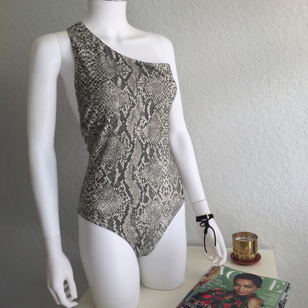 Half shoulder one piece swimsuit.