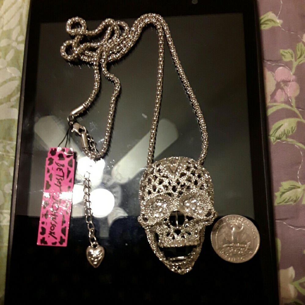 Long silver plated chain with large skull pendant