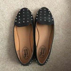studded black loafers