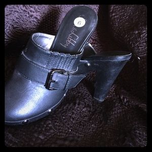 Sam and Libby black leather clogs