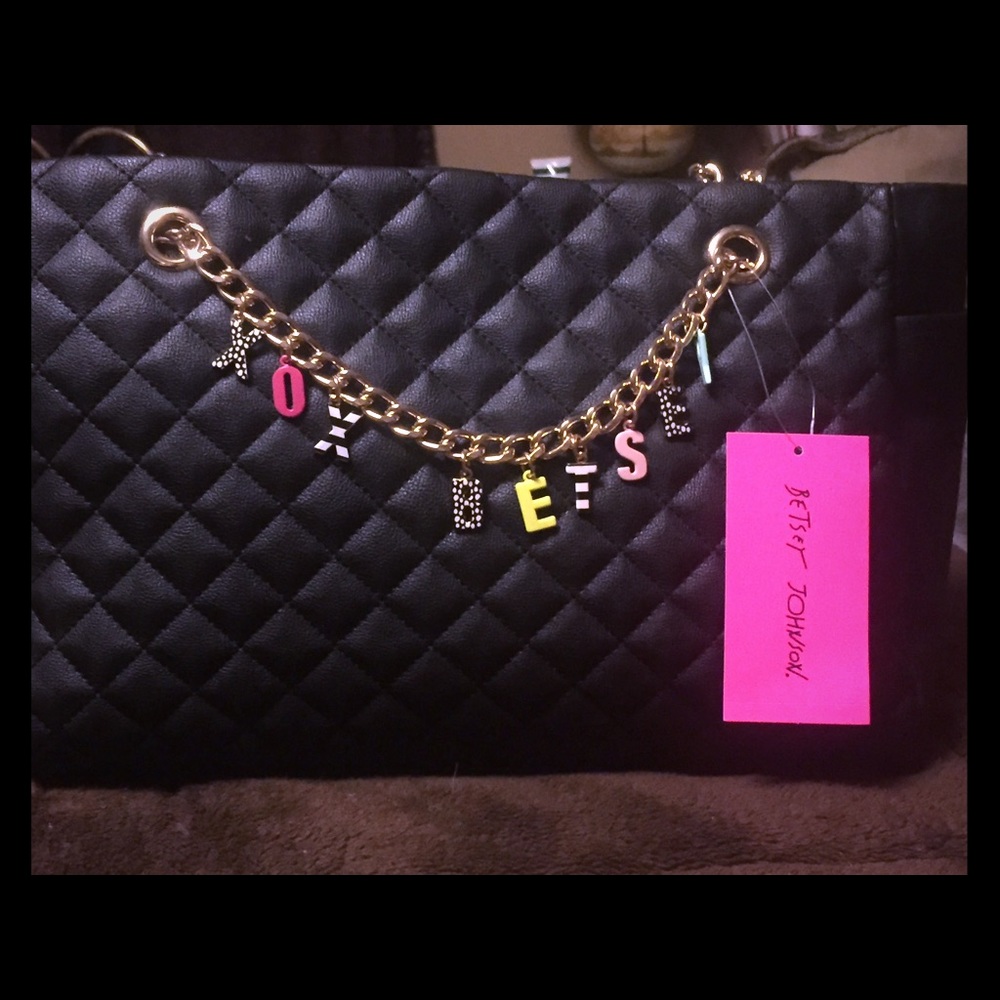 Brand new Betsey purse with tags. Retails $110.