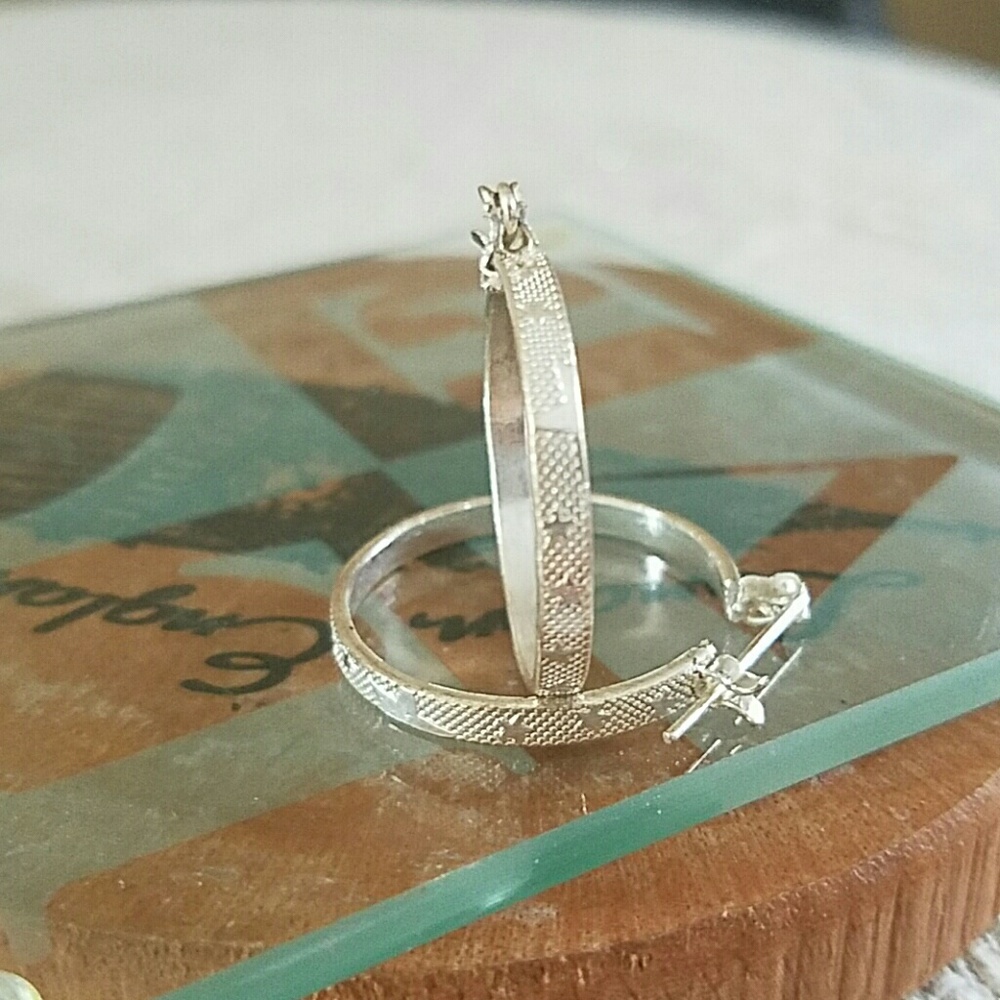 Silver star hoop earrings