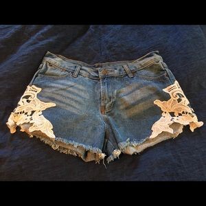 NWOT never worn Denim shorts with lace detail