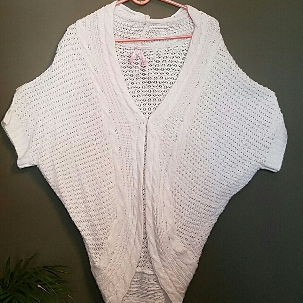 Long, cardigan-type off-white sweater