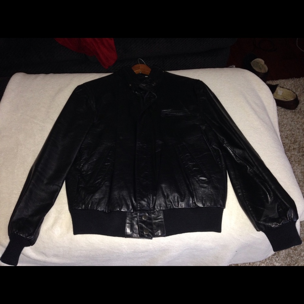Size 42 Amazing condition black leather coat