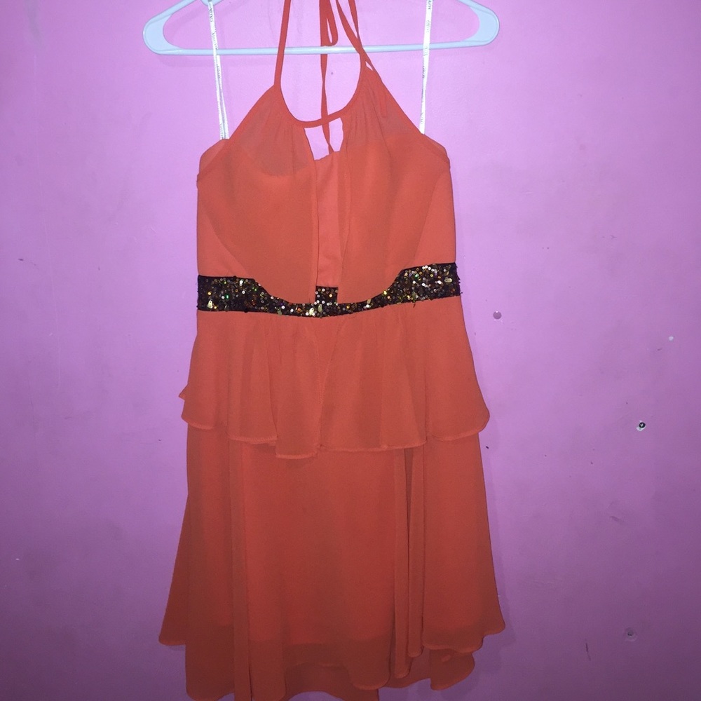 Never worn dress super cute orange w glitter belt