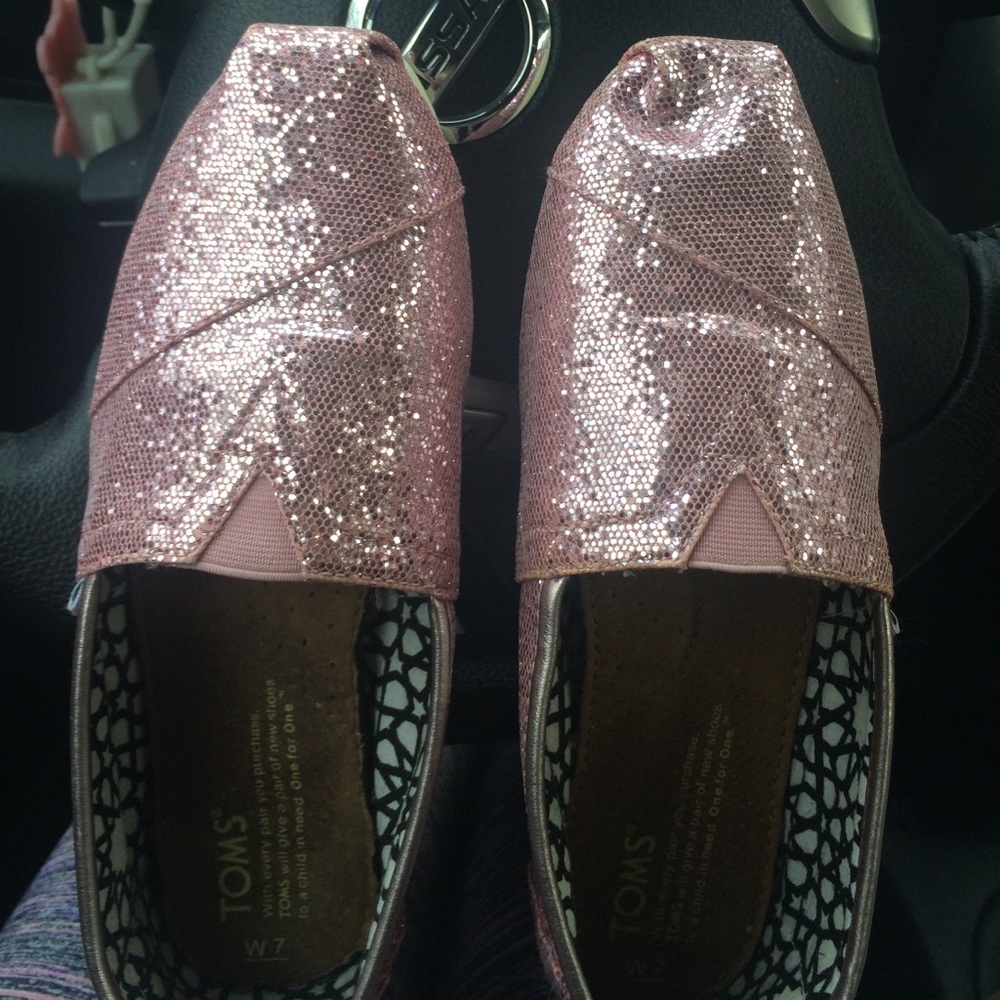Toms.   Never worn.  Sparkly pink