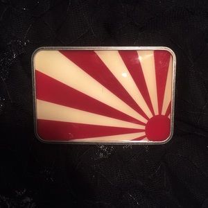 Rising sun belt buckle