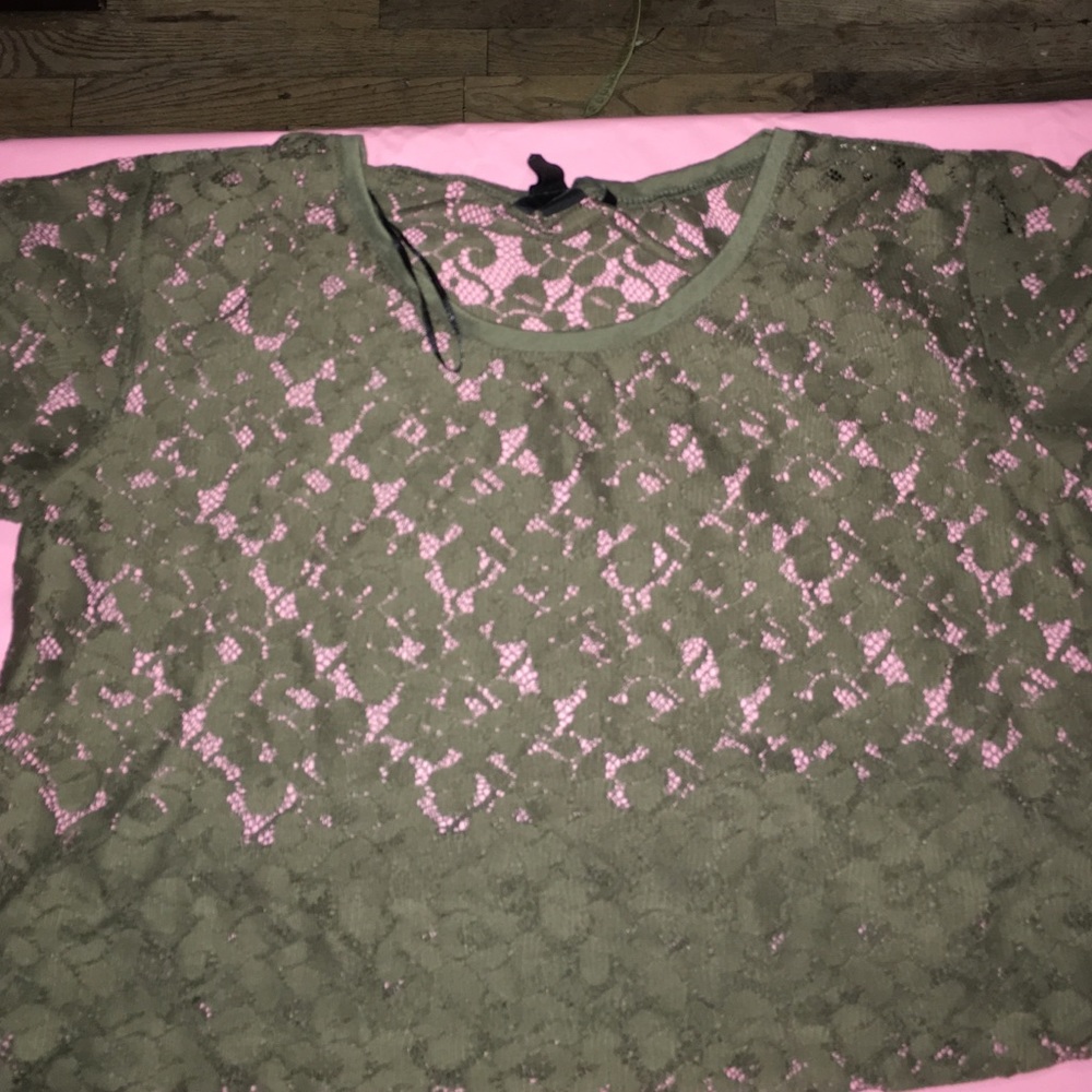 A olive greens and black  see through shirt
