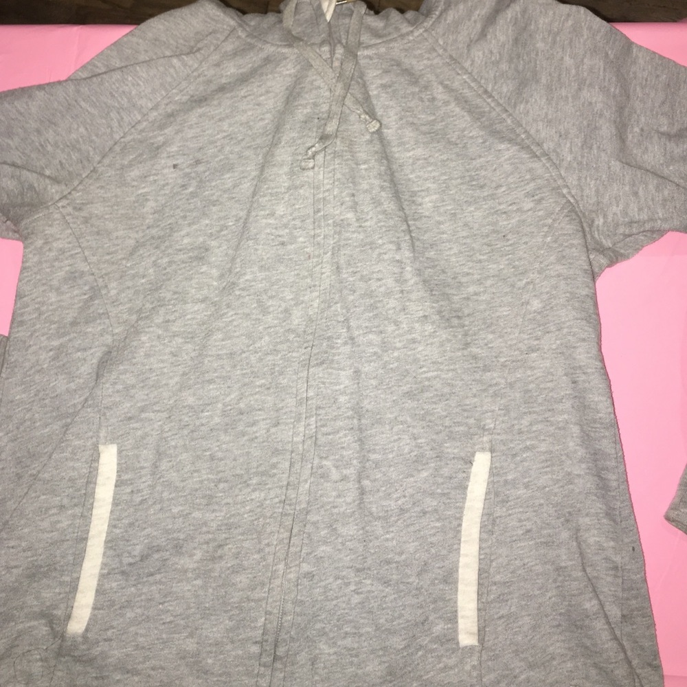 A dark and light grey sweater